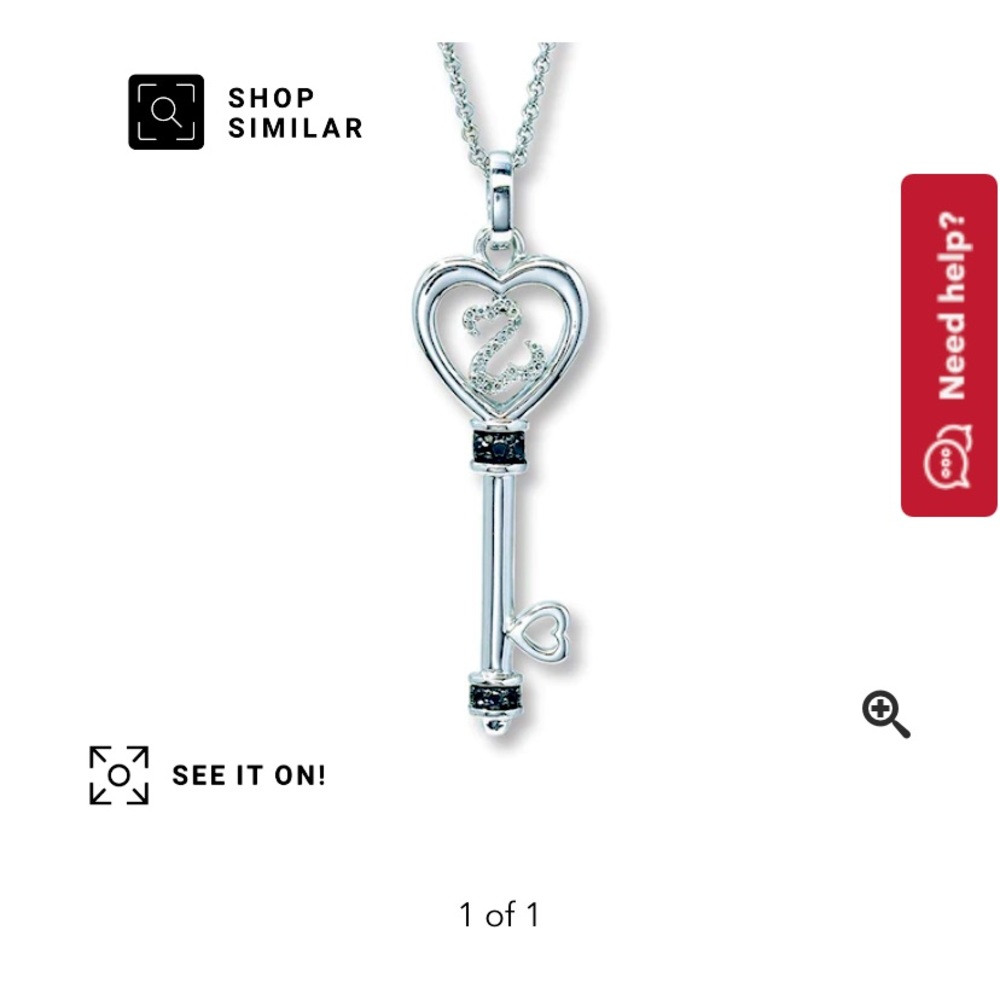 Lightly worn open heart key necklace.